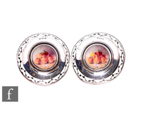 A pair of hallmarked silver and Royal Worcester bon bon dishes each with central Worcester panel decorated with strawberries,