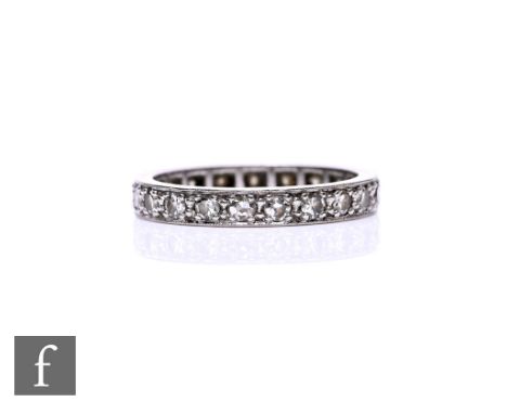 An 18ct white gold diamond full eternity ring, weight 3.4g, ring size L.