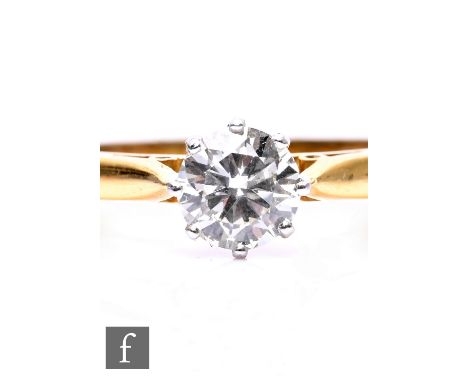 An 18ct hallmarked diamond solitaire ring, brilliant cut, claw set, weight approximately 0.75ct, colour H/I, clarity VS2, wei