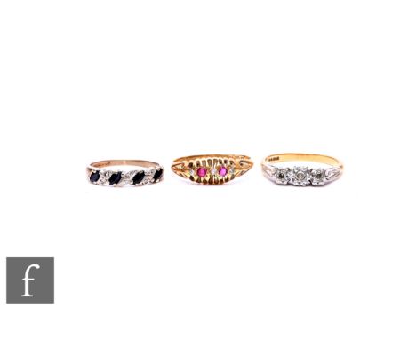 An early 20th Century 18ct ruby and diamond five stone ring with a further 18ct diamond three stone ring, total weight 6.3g, 