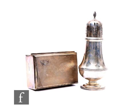 A hallmarked silver, cedar lined, rectangular cigarette box with engine turned decoration, with a silver sugar castor, total 