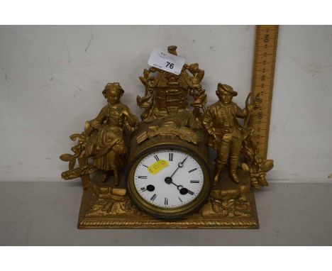 A late 19th Century continental mantel clock in figural gilt metal case