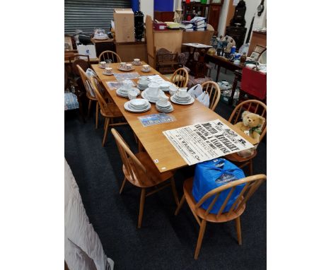 ERCOL STYLE EXTENDING DINING TABLE AND 8 CHAIRS