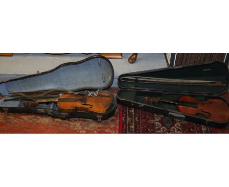 A cased violin and bow with spurious label for Stradivarius along with another cased violin and bow.