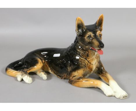 A Goebel model of a recumbent alsatian.