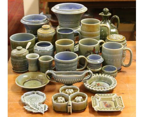 A large collection of Wade Celtic porcelain including ashtrays, vases, conserve jar, mugs, tobacco jar, etc.