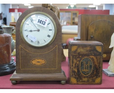 An Edwardian Mahogany Dome Cased Mantle Clock, with batwing inlay, black Roman numerals to white enamel dial, 21cm high. A  s