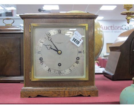 A XX Century Elliott Oak Cased Eight Day Lever Westminster and Whittington Chime Mantle Clock, with key, instructions, with r