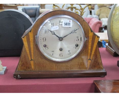An Art Deco Inlaid Mahogany Musical Mantel Clock, with Arabic numerals to silvered dial.
