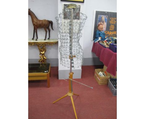 A XX Century Adjust Form (The Worlds Best Dress Making Model) Mannequin, on splayed supports.
