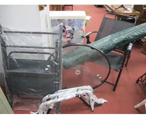 A Glass Topped Patio Table, and two folding chairs, plus travelling bench set.
