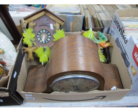 A 1930's Oak Cased Napoleon Clock, together with a cuckoo clock. (2):- One Box.