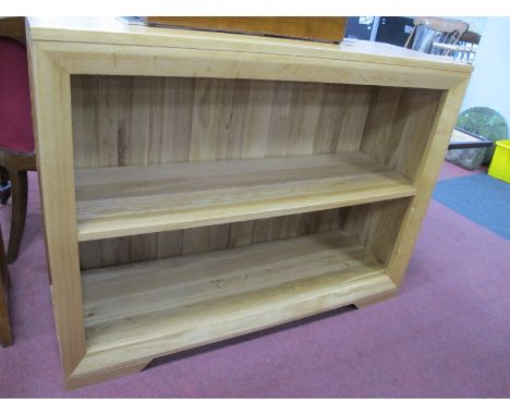 An Oak Rectangular Shaped Bookcase, with a single shelf, on bracket feet, 115cm wide.