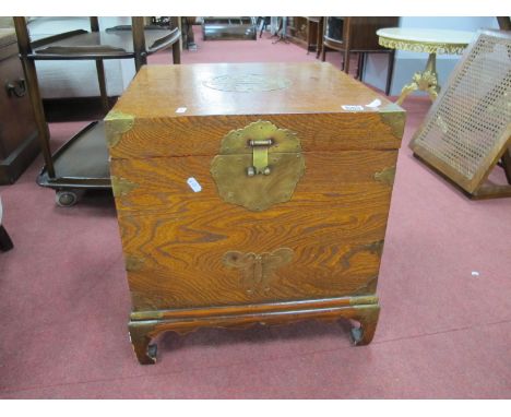 A Chinese Elm Box, with brass lock plate, brass mounts, carrying handles, on bracket feet, 44cm wide x 48cm high.
