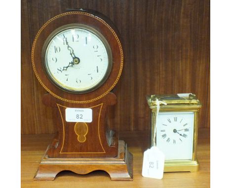 An Edwardian inlaid mahogany balloon shape timepiece, the enamel dial marked 'Ludgate Hill, London', movement replaced with b
