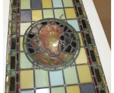 A pair of leaded-light window panels comprising thirty-five various coloured panels and multiple border, 88 x 55cm, (numerous