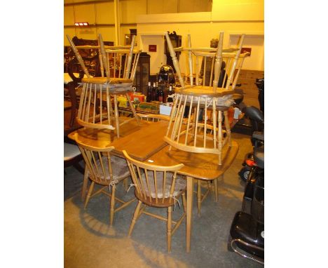 Ercol Light Wood Extending Dining Table with Leaf and 8 Chairs