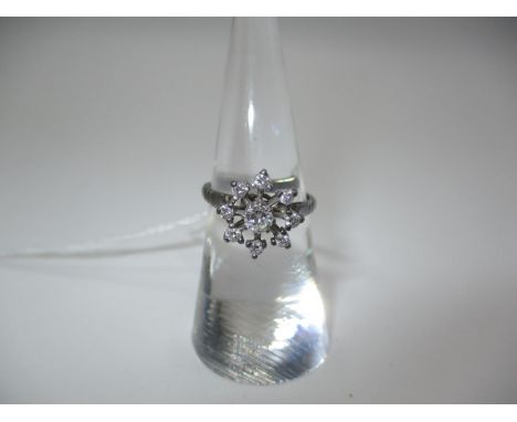 Diamond Flower Head Cluster Ring Set with a Central Diamond and 8 Smaller Diamonds in 18ct White Gold Mount, Size K