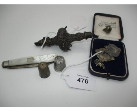 Victorian Embossed Silver Baby's Rattle/Whistle, Silver and Mother of Pearl Pocket Fruit Knife, 2 Medals and 2 Thimbles