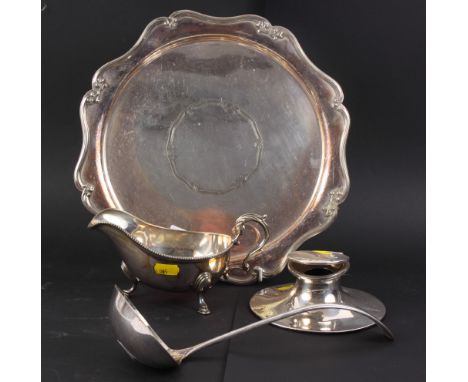 A silver plated salver, a plated sauce boat, a plated ladle and a silver capstan inkwell (a/f)