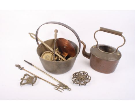A copper kettle, a brass preserve pan, a brass ladle and other items of metal ware