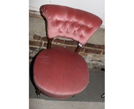 A Victorian nursing chair, button upholstered in a pink velour