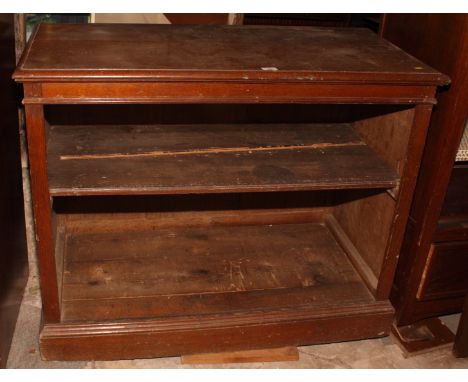 An oak deep open bookcase, fitted one shelf, on block base, 45" wide