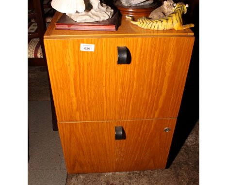 A mahogany open bookcase fitted three shelves, 32" wide and a two drawer light oak filing cabinet