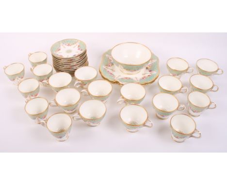 A mid 19th Century bone china gilt turquoise enamel decorated part tea service