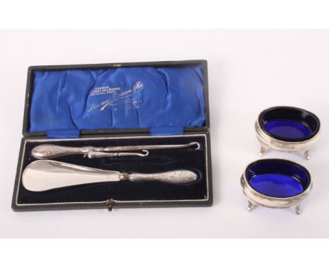 A pair of Georgian design plain oval silver salts decorated threaded edges, 1.71oz troy approx, and a cased set of two button