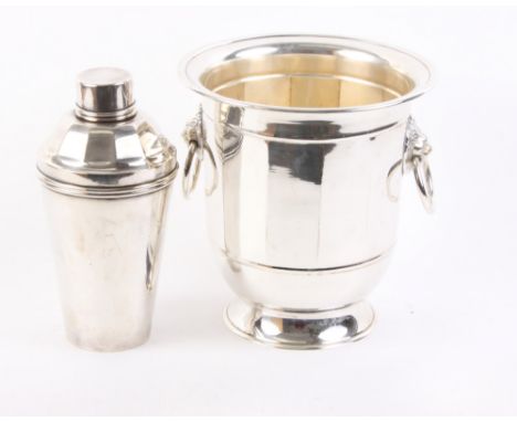 A silver plated octagonal wine bucket, a matching cocktail shaker and a pewter bottle stand and pourer