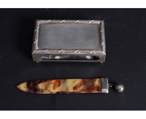 A tortoiseshell bookmark with sterling silver top, a silver matchbox cover with reed and tie decoration and a lady's EPNS pie