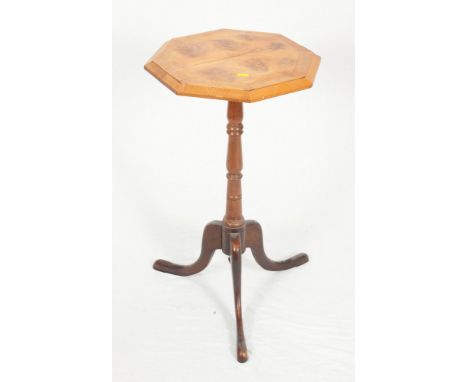 A 19th Century octagonal occasional table, top decorated oyster yew veneers, on tripod base, 16" dia