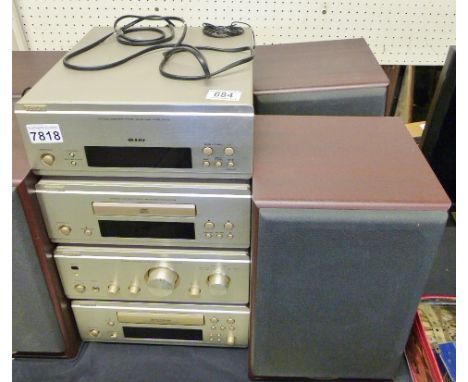 DENON STEREO SYSTEM. Denon stereo system including tuner, amplifier, CD player, cassette player and speakers
