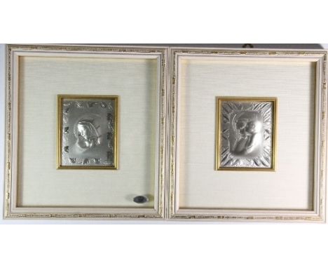 A pair of framed Ottaviane sterling silver relief panels of the Madonna and child. 23.5 x 26cm