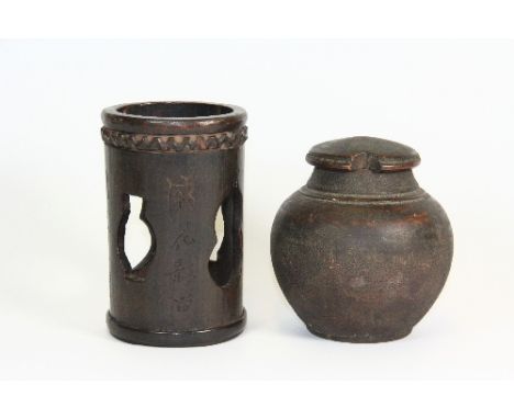 An early 20thC Chinese carved rosewood and bamboo brush pot  H:12.5cm together with a 19thC turned wooden Chinese tea caddy