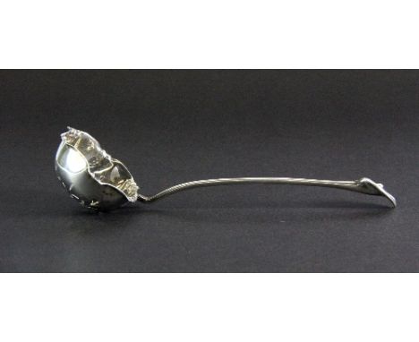 An Art Nouveau hallmarked silver sugar sifter spoon with peace lily handle L.14cm