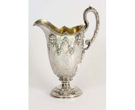 A heavy hallmarked silver cream jug H.17cm London c.1864 by Edward and John Barnard. Prov. Property of a Lady