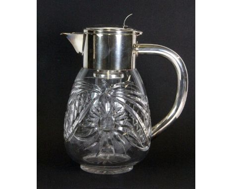 A silver plate and cut crystal water jug H.27