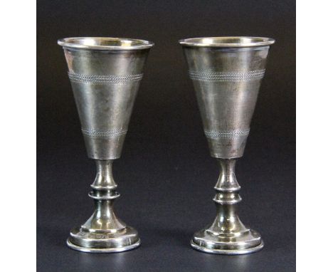 A pair of hallmarked silver Kiddish cups