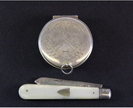 A hallmarked silver communion wafer case and a hallmarked silver and mother of pearl fruit knife.