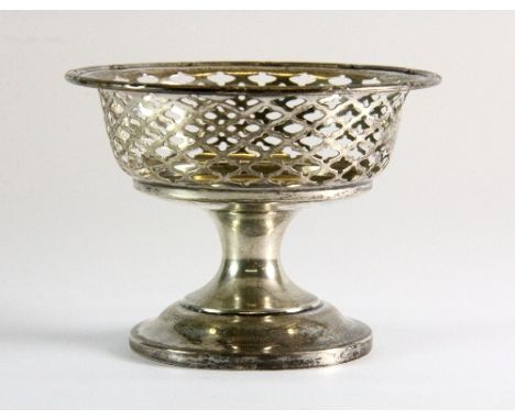 A hallmarked silver pierced bonbon dish (worn mark) Dia 9cm H.6.5cm