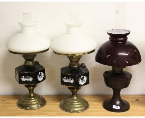 Brown Bakelite oil lamp and 2 ceramic oil lamps