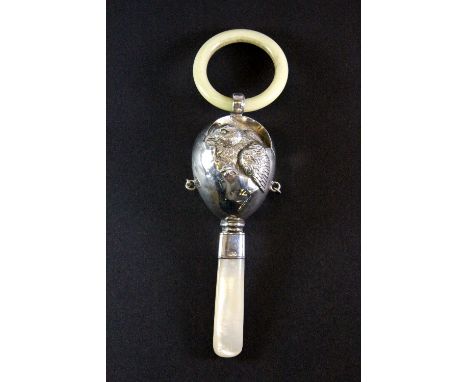 A hallmarked silver and mother of pearl baby's rattle