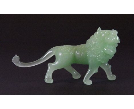 A 19th/early 20thC Peking glass lion imitating jade (13cm x 6.5cm)
