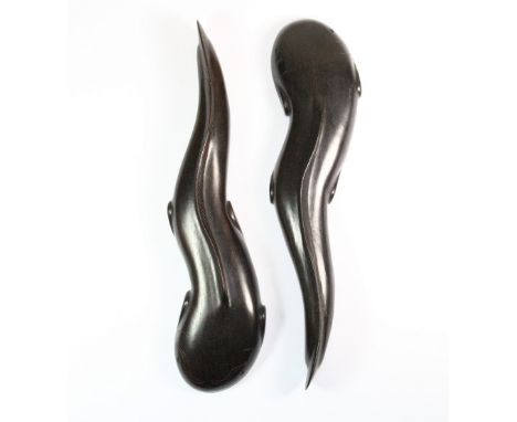 A pair of Chinese carved hardwood scroll weights in the form of catfish L.29cm