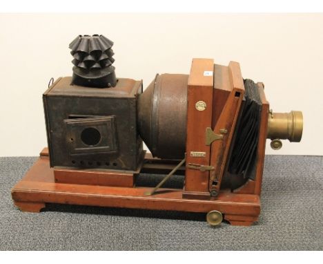 A Thornton and Pickard Victorian mahogany cased "ruby" photographic plate enlarger