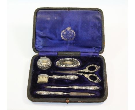 A Victorian silver manicure set (scissors a/f)