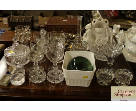 A quantity of various glassware including rummers, decanters stoppers, a lustre hung candlestick and a heavy cut glass bowl a