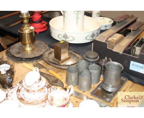 A collection of silver plated ware to include trays, cutlery, a brass converted oil lamp, pewter tankards etc. 